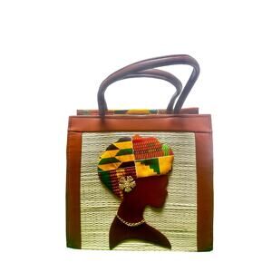 Woven straw Kente cloth handbag with woman silhouette